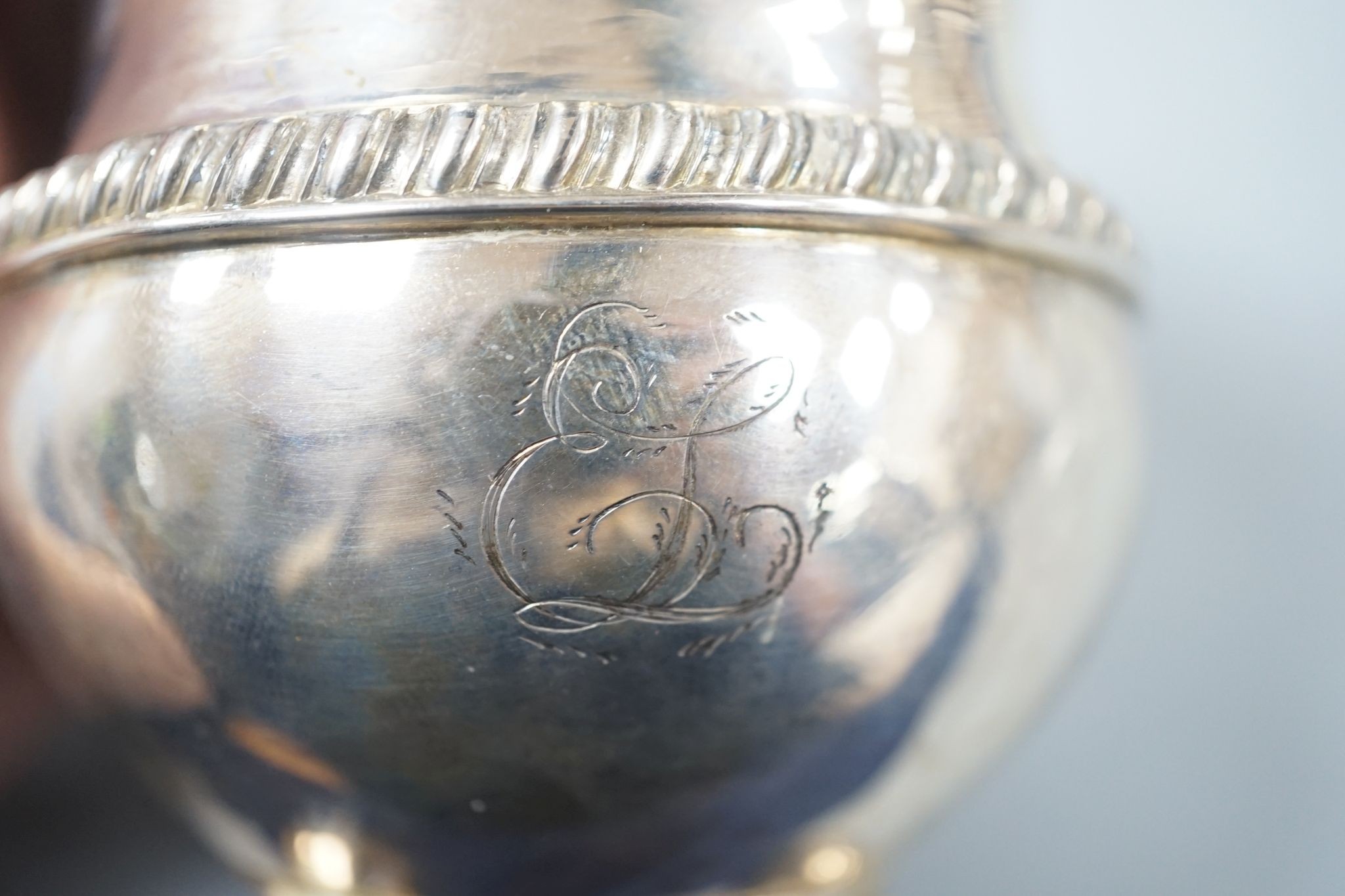 A late George III silver cream jug, J.S?, London, 1817, 10.2cm, 6.5oz.